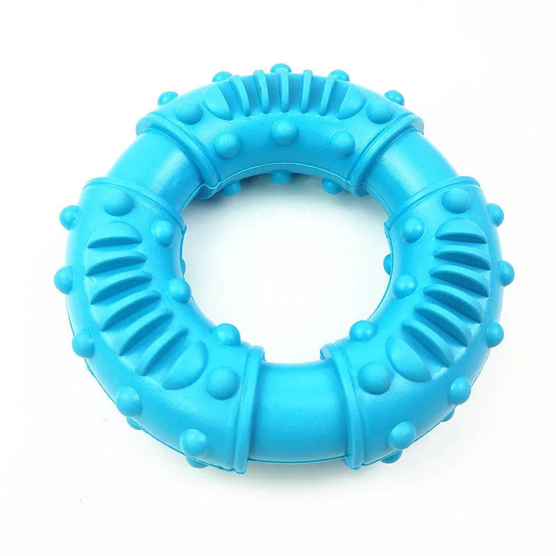 Blue hollow dog fetch stick toy on grass, showing lightweight chewy design for catch and fetch play.