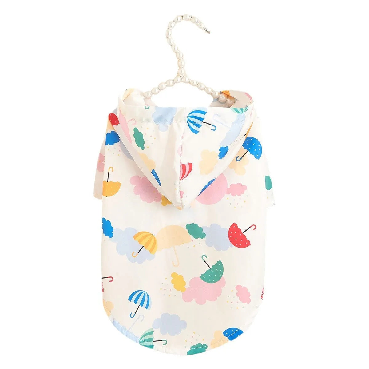Colourful cartoon umbrella pattern dog raincoat sized L on a golden retriever.