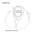 Gold or silver coloured heart-shaped body chain for women with rhinestone detailing.