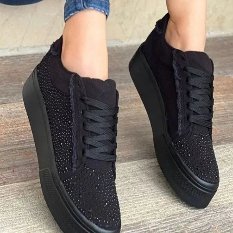 Plus size women's rhinestone casual sports shoes in black with a chunky flat rubber sole and front lace-up.