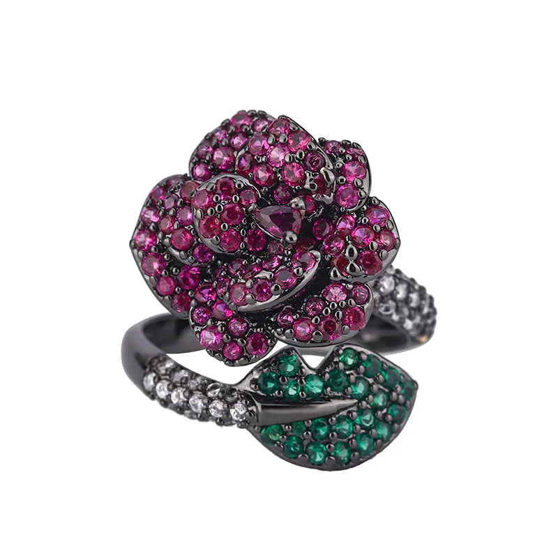 Geometric black gold ring with simulated red corundum stones on gold-plated copper band