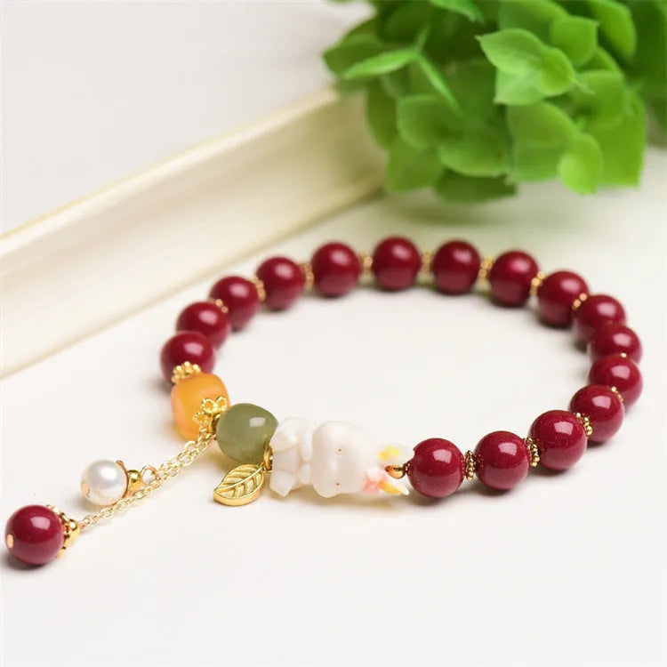 Traditional Chinese cinnabar bracelet with rabbit design in 8mm and 10mm bead size options.