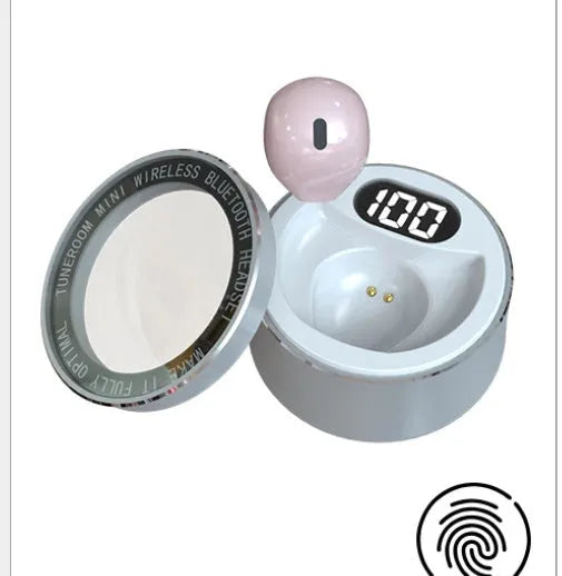 Miniature 9mm transparent Bluetooth earphone in skin tone, shown fitting discreetly in an ear.