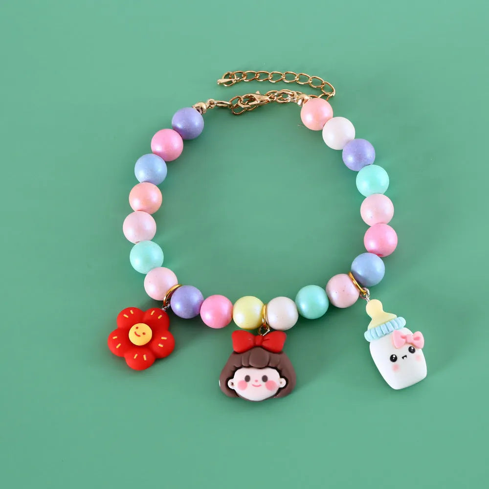 Colourful macaron-themed pet collar, necklace, and bracelet set in resin with adjustable sizing.