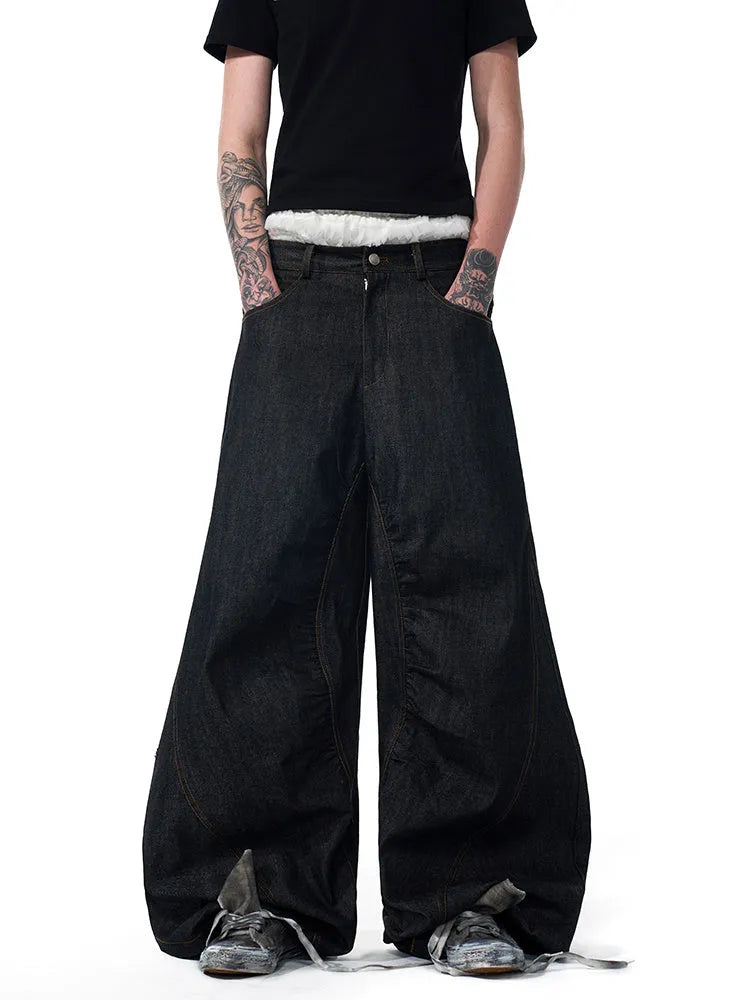 Black wide-leg straight jeans with temperature-sensitive colour-changing embroidery on the leg