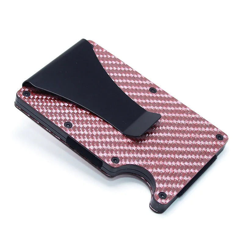 Geometric aluminium and carbon fibre card holder in multiple colours on a table, showing slim 8mm profile.