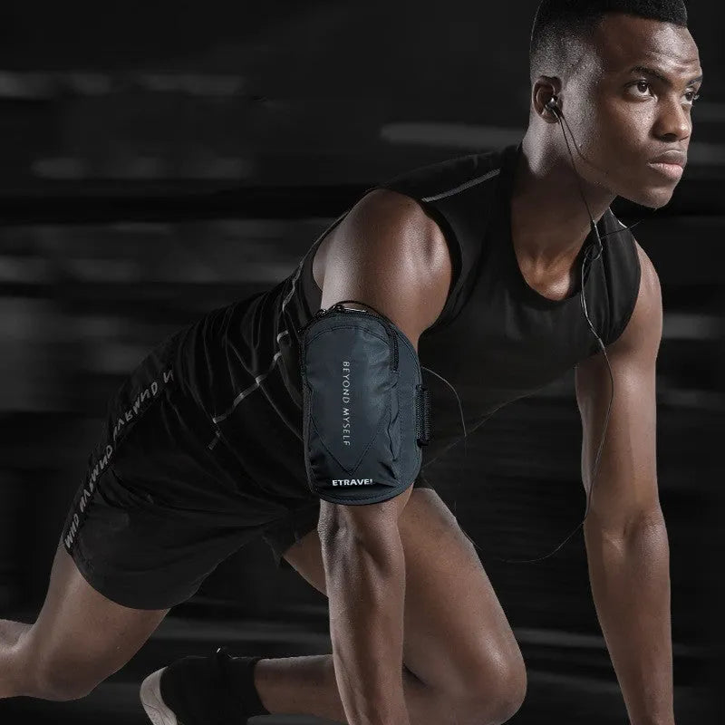 Reflective black running arm bag with adjustable strap, holding a mobile phone, shown on a runner's arm.