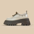 White women's platform Mary Jane shoes with chunky heel and XINGX bear design on round toe