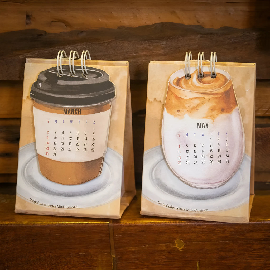 Mini 2025 desk calendar with themed designs for small desk spaces