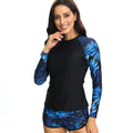 Women's floral print wetsuit set with long sleeve top and shorts for water sports