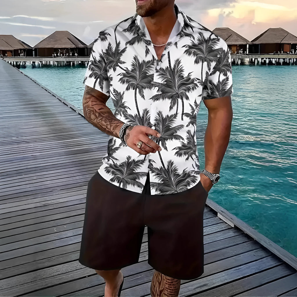 Man wearing a blue and white 3D printed Hawaiian shirt with matching shorts.