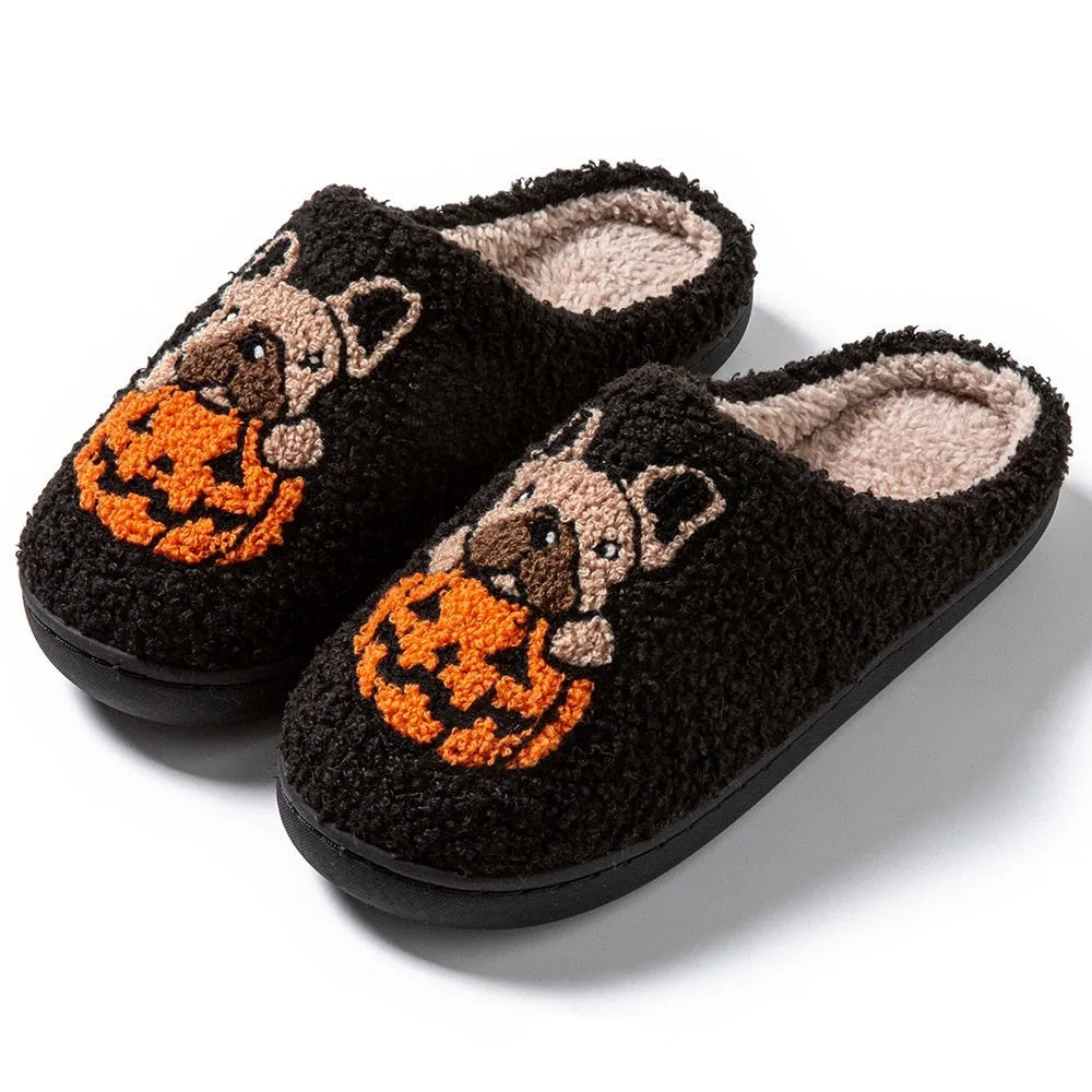 Black and white Halloween pumpkin slippers with plush upper and TPR rubber soles
