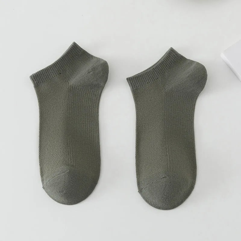 Men's solid colour polyester low-cut boat socks shown in multiple colour options