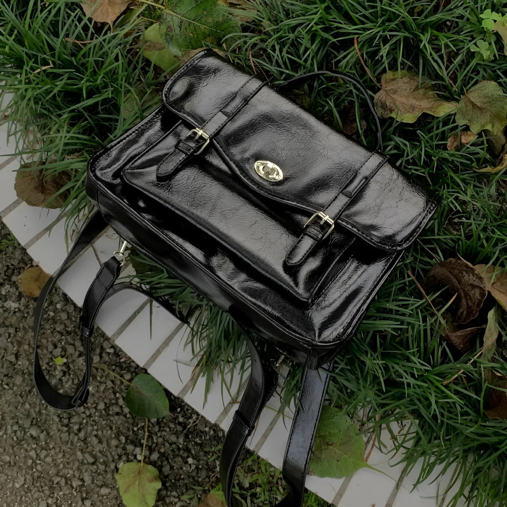Black oil wax PU leather college messenger bag with dimensions 35cm length by 20cm height