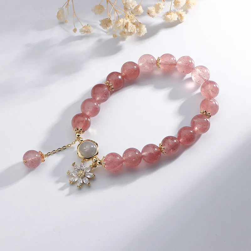 Natural strawberry quartz Mori-style bracelet with floral details on electroplated metal