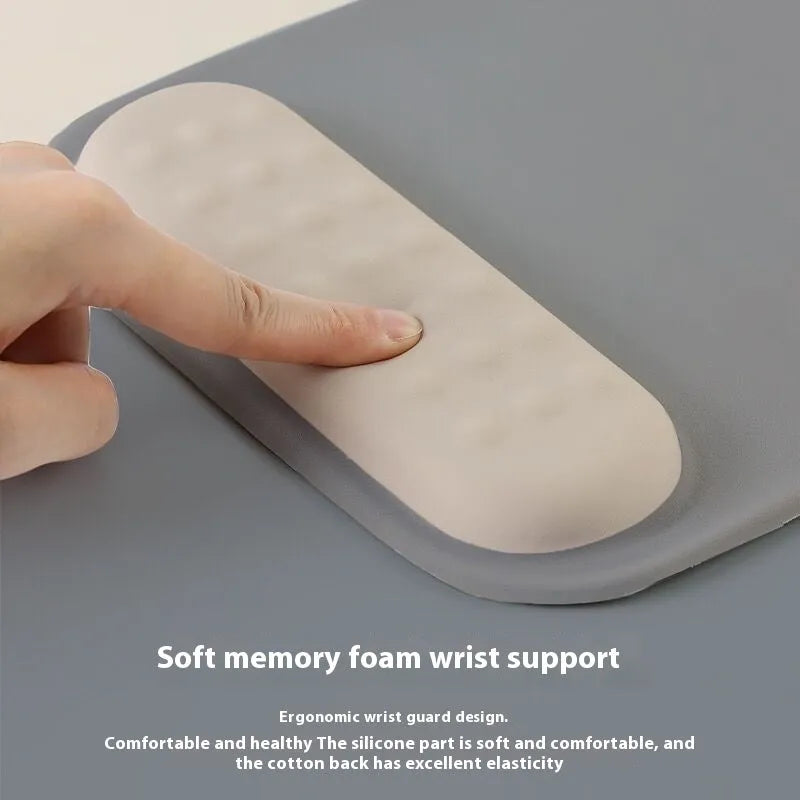 Ergonomic mouse pad with wrist rest in cloth silicone construction showing colour pattern options