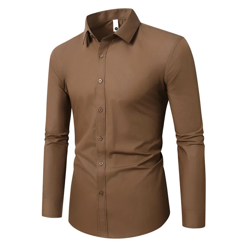 Man wearing a loose slim-fit linen long-sleeve shirt in a neutral colour.