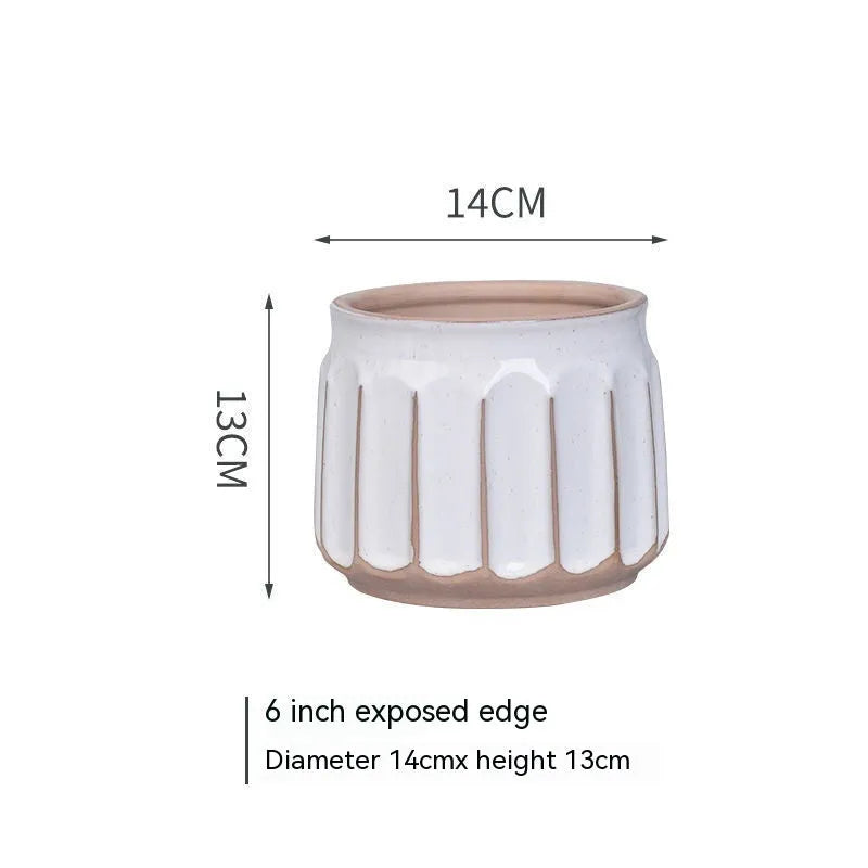 Nordic simple striped ceramic flower pot in white, 14x13cm size, on a desktop with a small plant