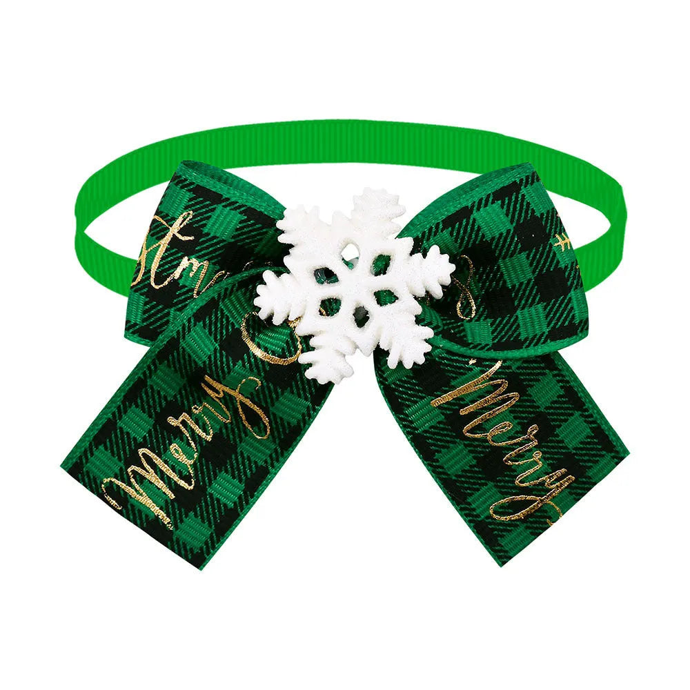 Red and green polyester Christmas pet bow tie in British style on a white background