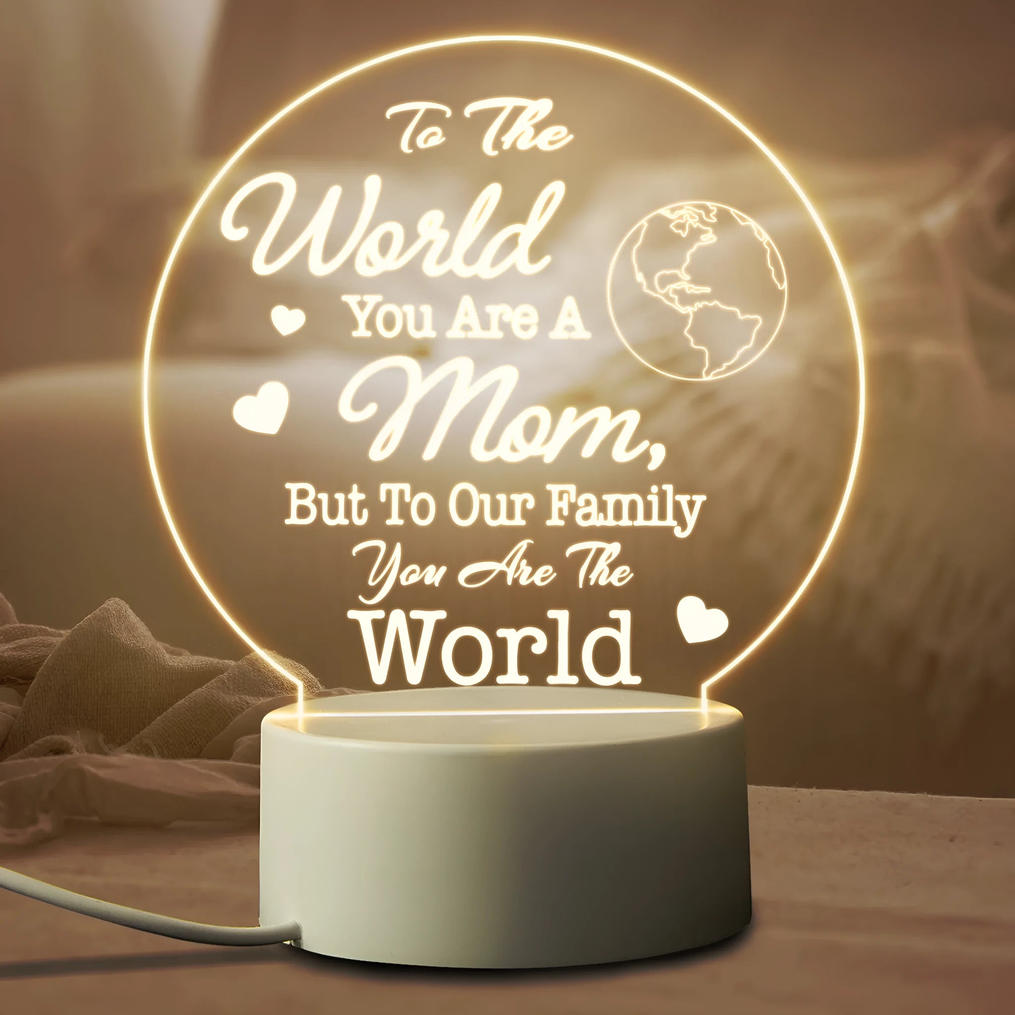 Modern minimalist LED night light with acrylic shade on white ABS base, powered by USB cable.