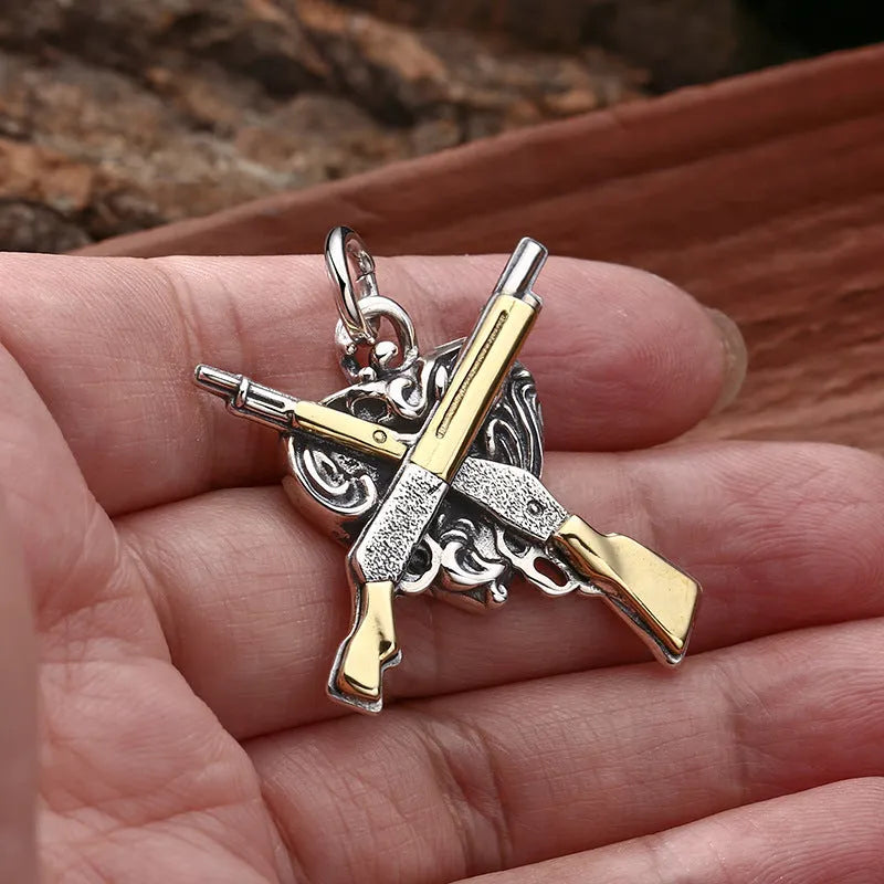 925 sterling silver pendant with dual gun heart-shaped design, 34 by 31 millimetres, silver colour