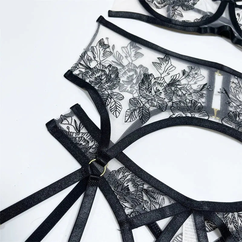 Black women's lace mesh floral print three-piece set showing top, pants, and waist ring.