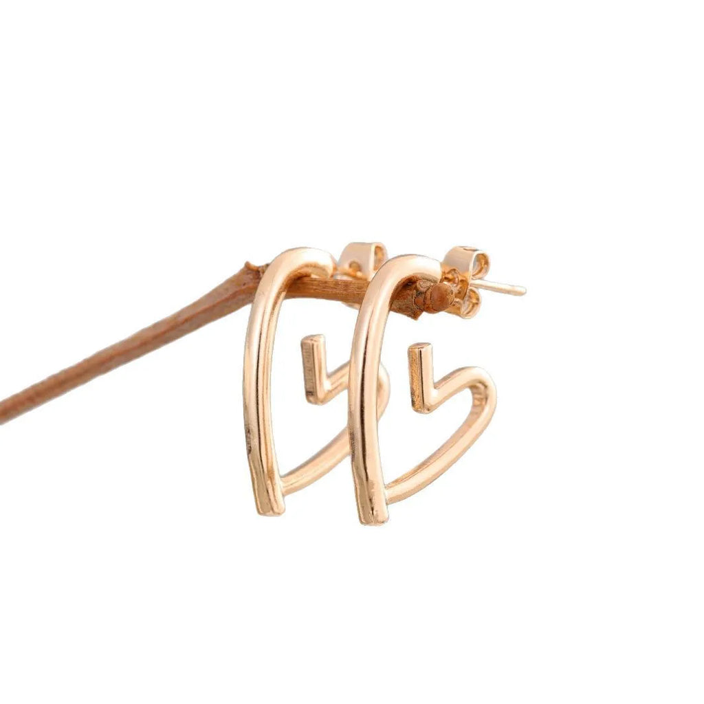 Simple cold style love earrings for women in golden colour metal alloy finish
