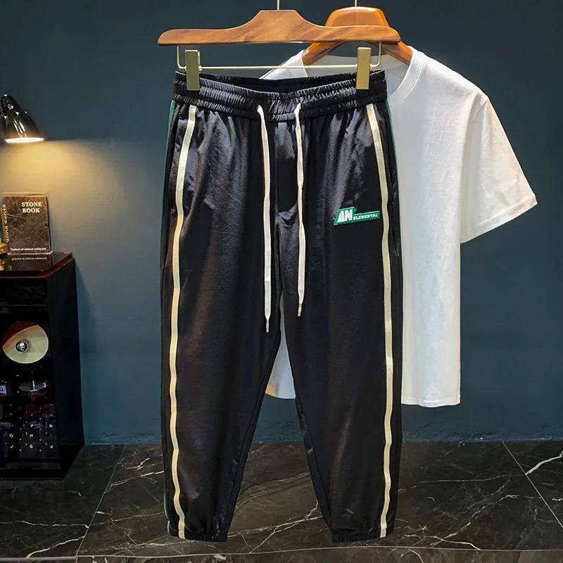 Men's solid colour cotton harem trousers with elastic mid-waist in black or grey