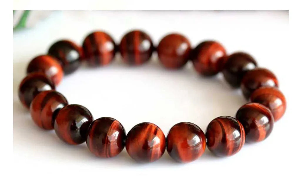 Red tigereye cat's eye beaded bracelet, grade 7A Lightning Eye Reserva, round geometric wood alexandrite beads