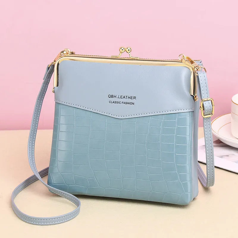 Retro solid colour PU leather messenger shoulder bag 18x4x17cm with embossed finish and multiple internal pockets
