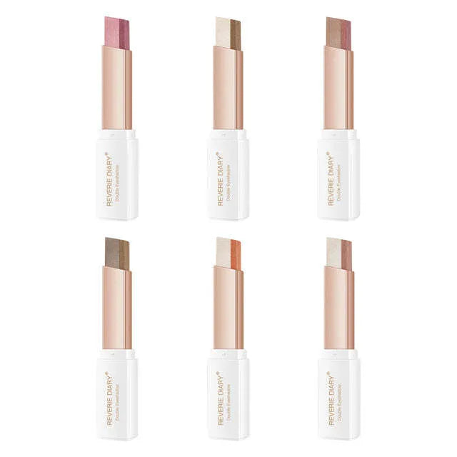 Two-color gradient eye shadow stick with smudge effect and push-button release