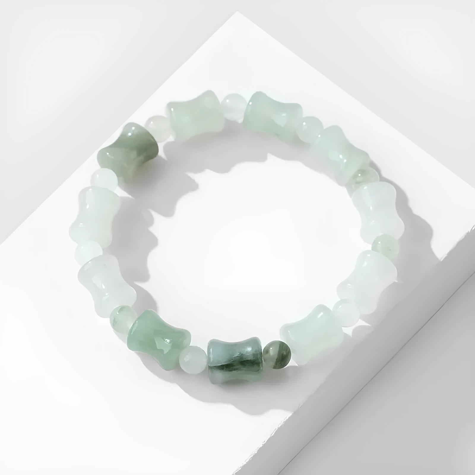Tianshan Emerald natural chalcedony diamond-shaped stone bracelet with coconut shell beads and safety lock on elastic string.