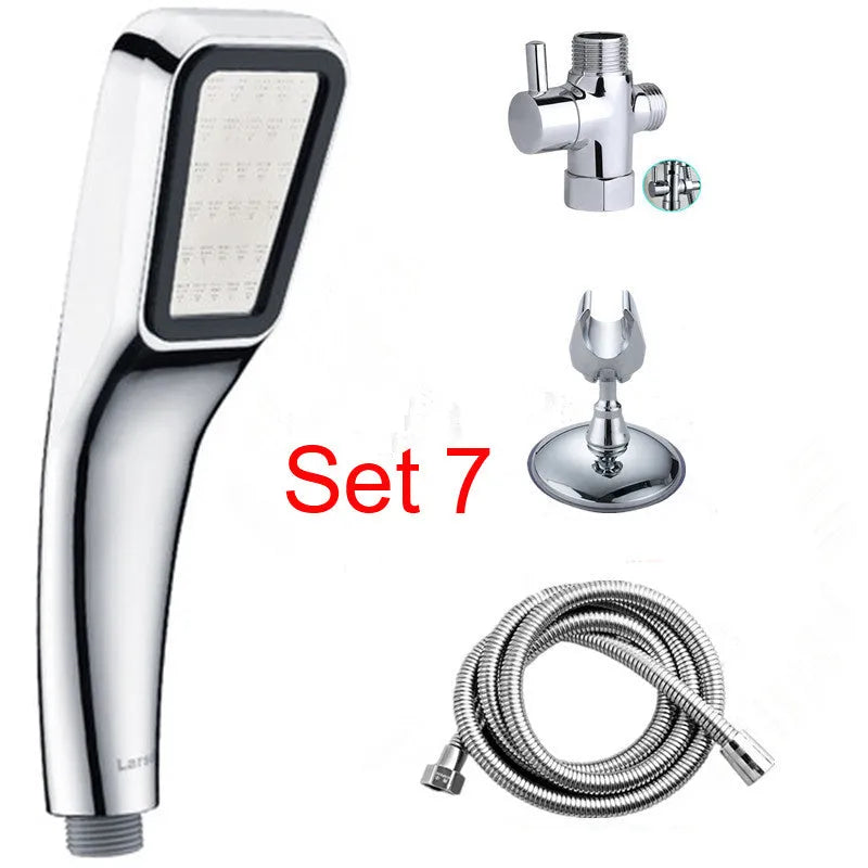 Hand-held pressurised rain shower head in orange and seven set configurations