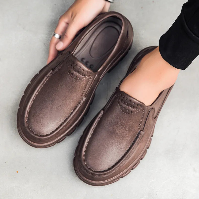 Men's black waterproof slip-on work shoes with platform sole and leather lining