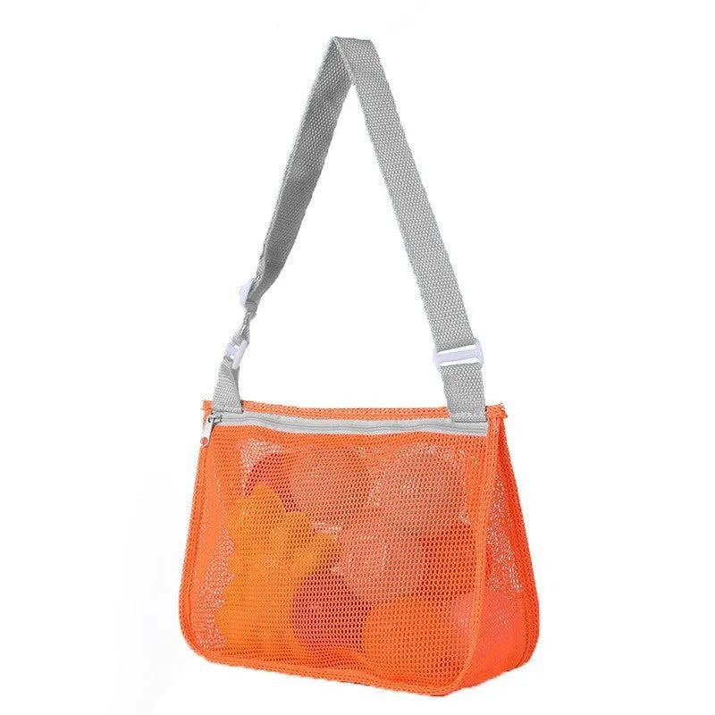 Blue nylon mesh travel storage bag with black handle and zip seal for children's clothing organisation