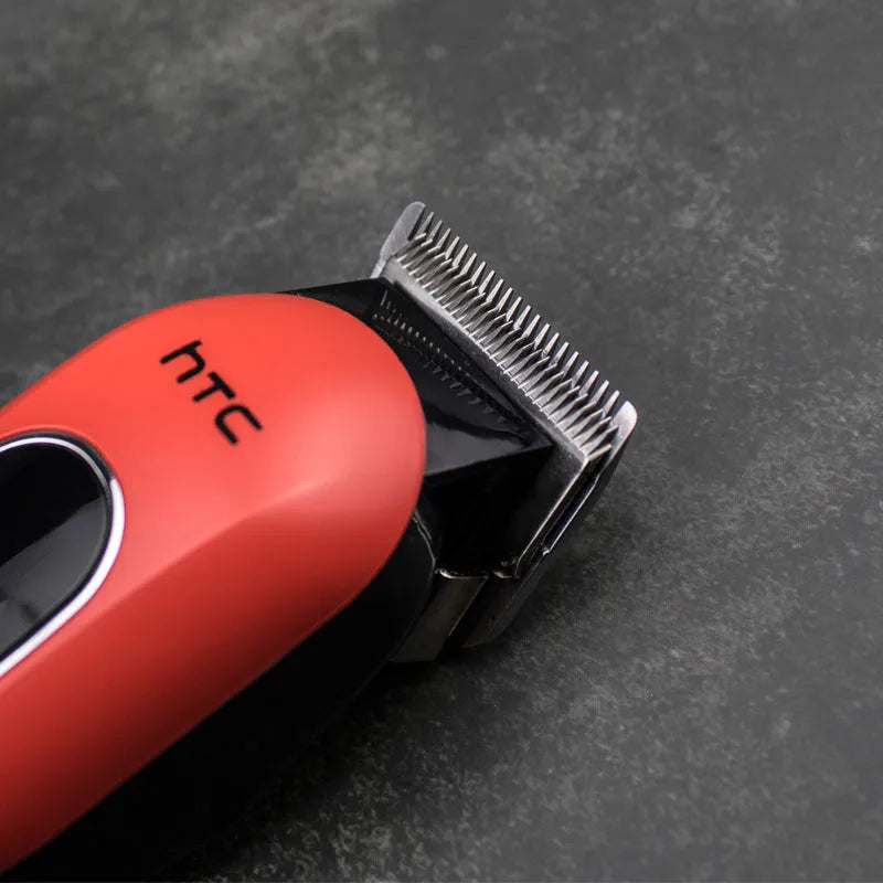 Professional digital electric hair clipper in black, red, or white with brushless motor, charger, combs, and cleaning tools
