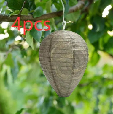 Paper and wire honeycomb lantern in photo background colour, 22cm wide by 28cm high.