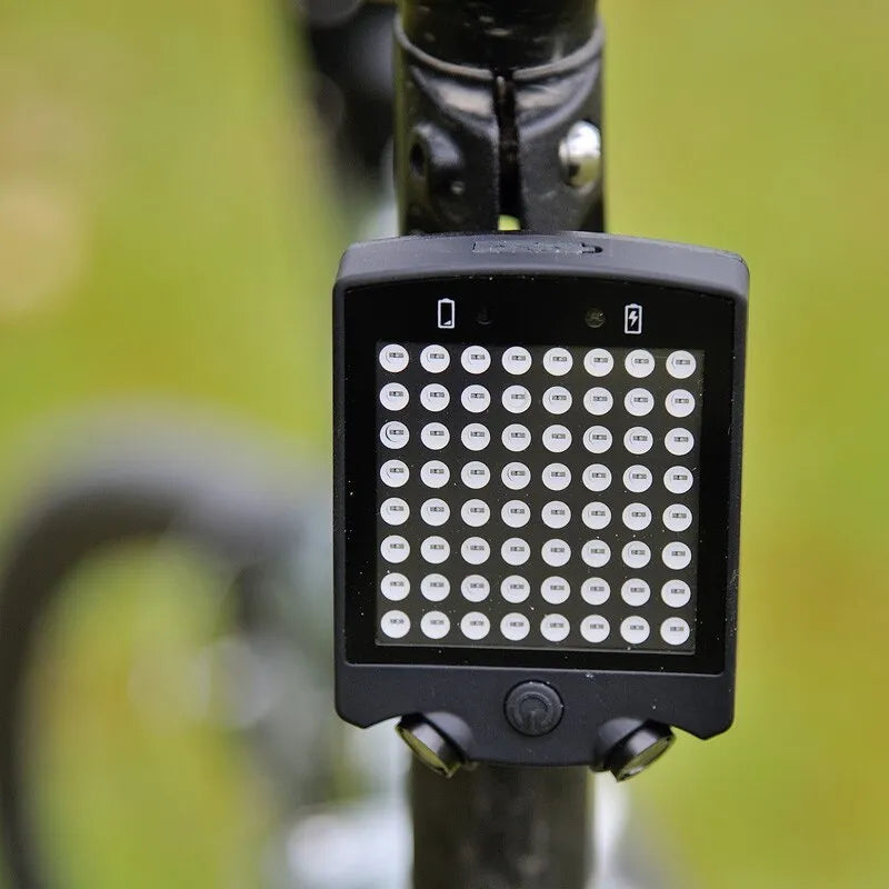 Black LED bicycle turn signal with wireless remote control dot matrix display and laser line