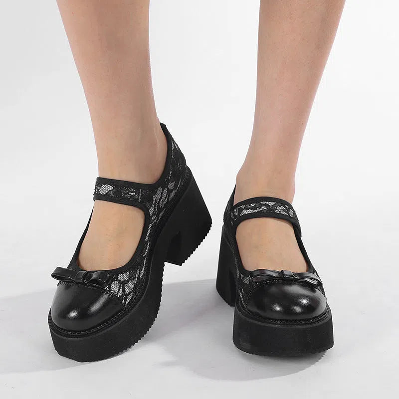 Black waterproof platform Mary Jane shoes with chunky 6–8 cm heel, mesh upper, Velcro straps, and round toe
