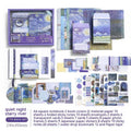 Hand Account Suit creative journal gift box open to show A6 grid notebook, assorted papers, cards, stickers, and a water drop bookmark.
