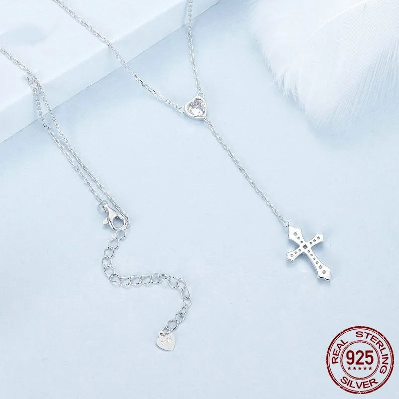 Women's sterling silver V-neck cross necklace on an O-ring chain in BSN384 colour.