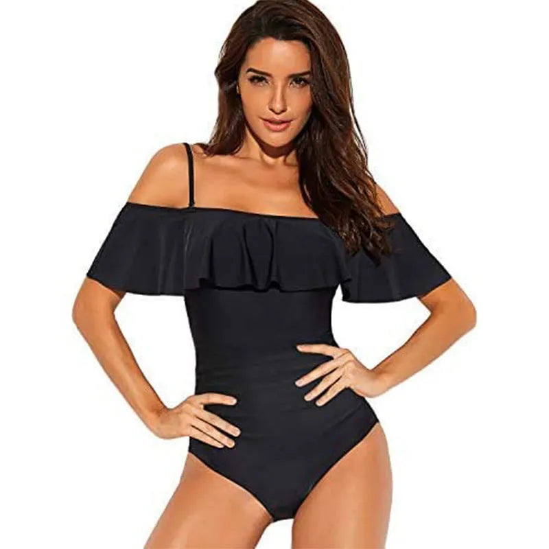 Black one-piece swimsuit with cut-out sides and ruffled shoulder straps
