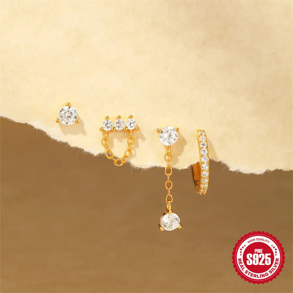 Simple geometric sterling silver earrings with a clover petal design and electroplated gold accents.