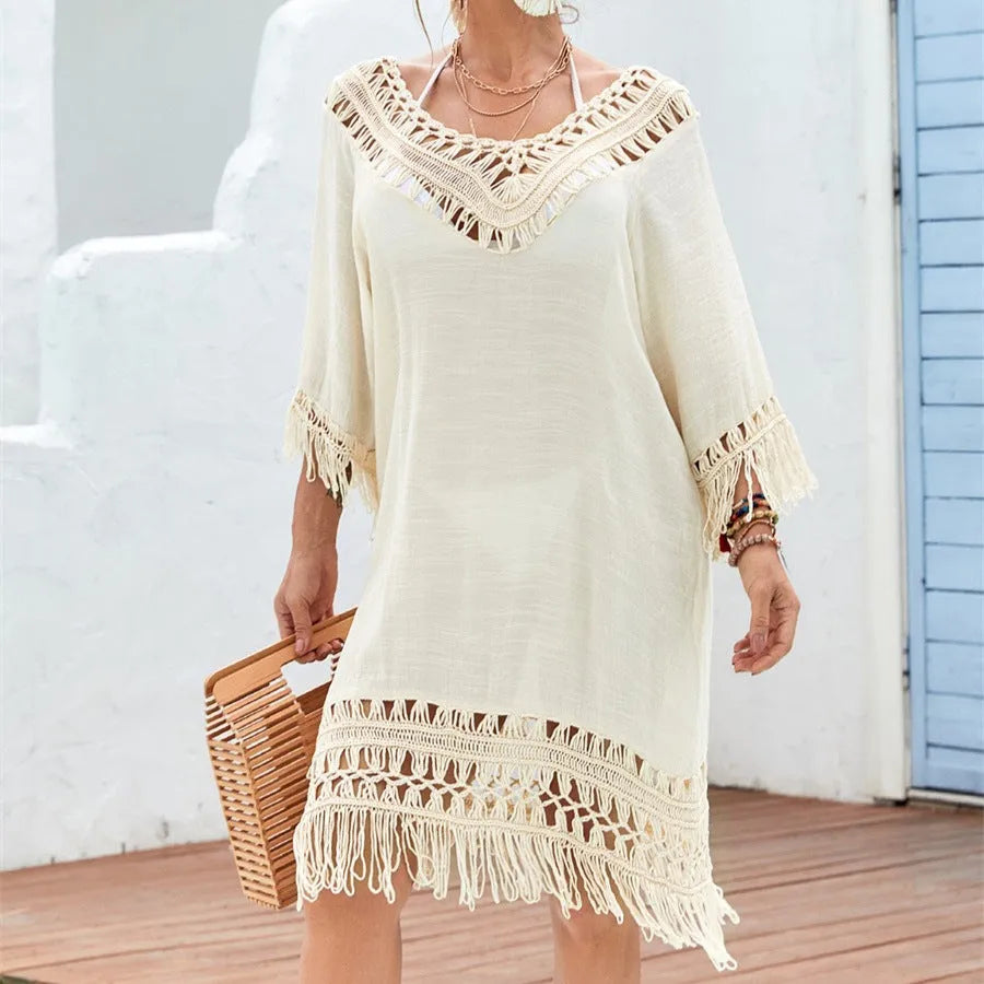 Apricot-coloured women's crocheted patchwork dress with mid-length skirt and half sleeves.