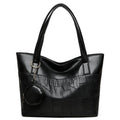 Large capacity soft PU tote bag for women in beige, brown, and black, with double shoulder straps and sewing thread detail.