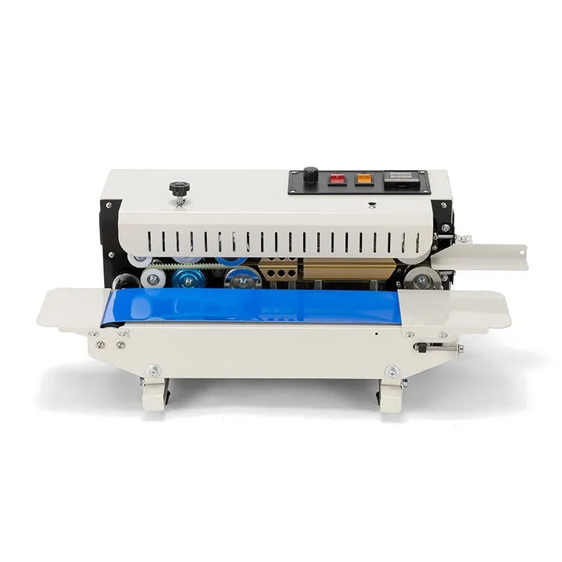Compact manual steel seal sealing machine with integrated date printer on a worktop.