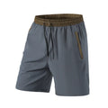 Men's wide waist cropped loose track pants in black and grey for running and fitness