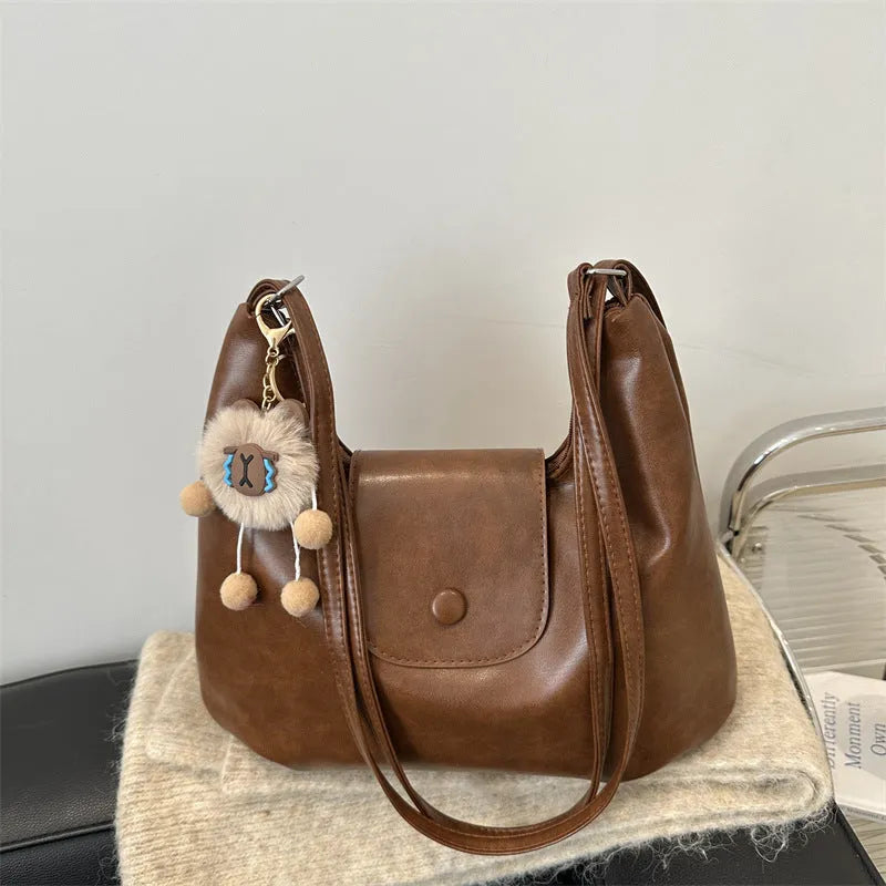 Textured PU leather women's shoulder backpack in horizontal square shape with single strap