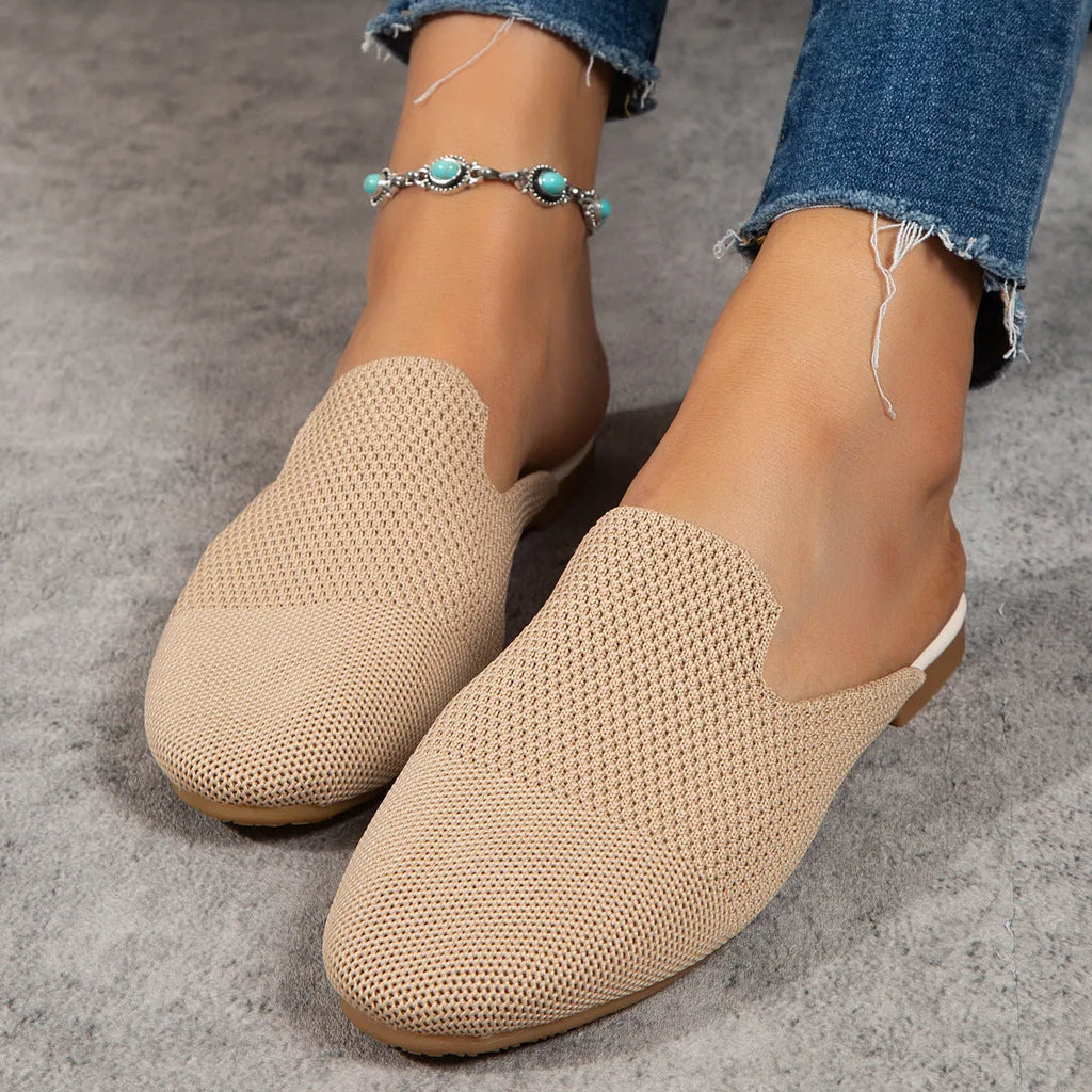 Women's apricot mesh slip-on sandals with round toe and rubber sole on a plain background.