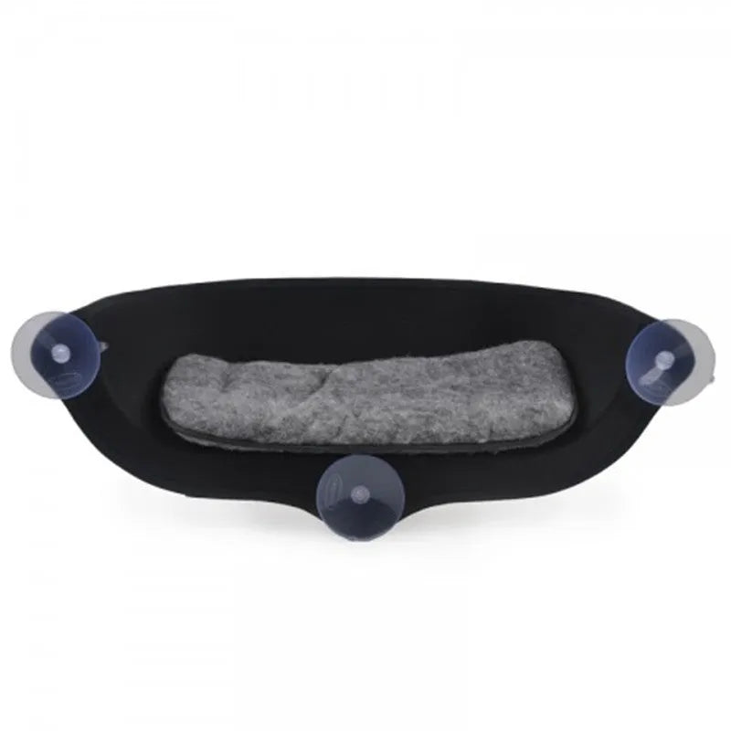 Cyan EVA window cat hammock with suction cup attached to glass
